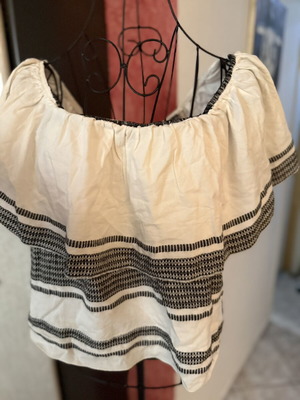 White blouse with black geometric details, boho style