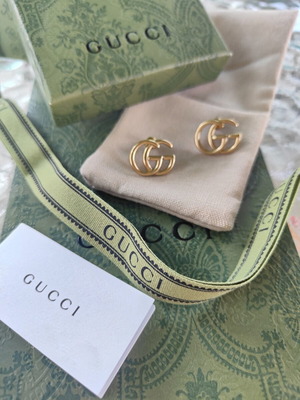 Gucci GG earrings in gold tone, new