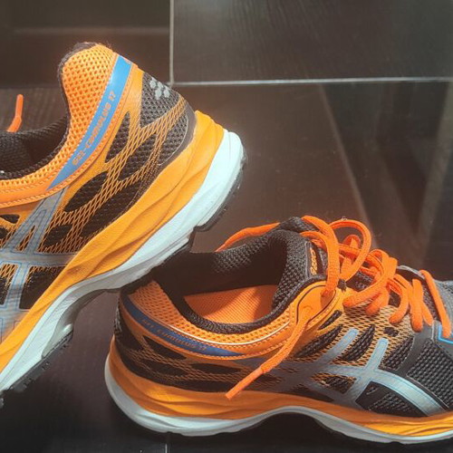 Asics Cumulus 17 running shoes, size 38, black and orange