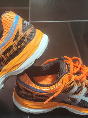 Asics Cumulus 17 running shoes, size 38, black and orange