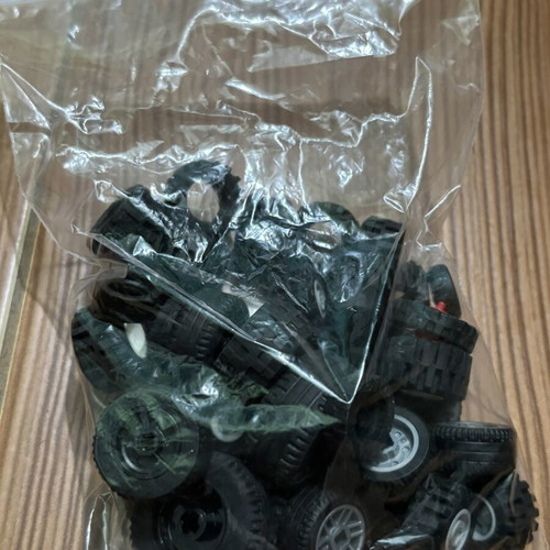 Lego wheels set like new, 65 parts including tires and inner pieces