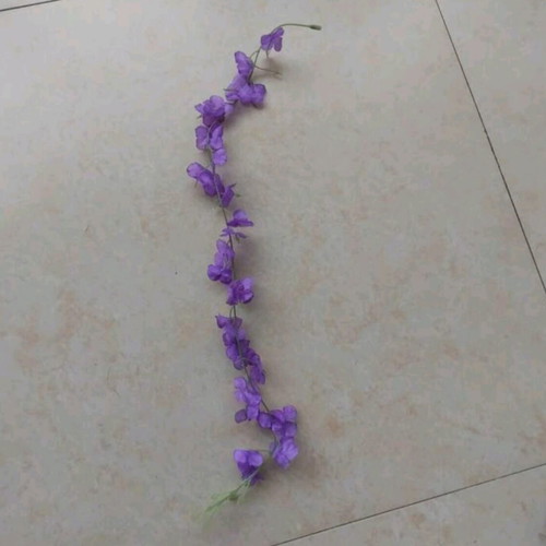 Artificial flowers like new, set of 50 in yellow, purple, and fuchsia pink