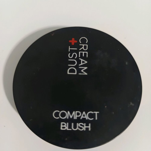 Dust and cream compact blush in coral brown shade