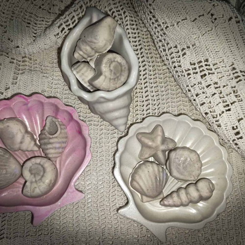 Set of handmade olive oil soaps with porcelain bases