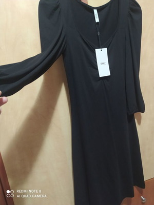 Only dress new, black, knee-length with gathers