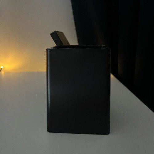 Pen holder with wireless phone charger