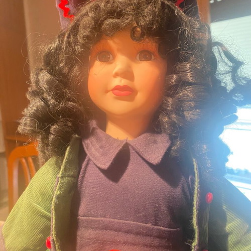 Porcelain doll like new from collection