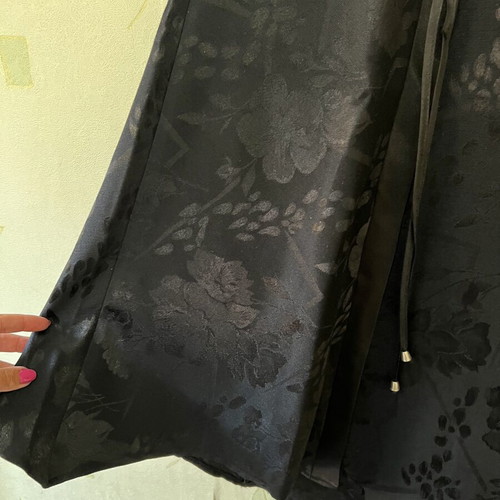 A-Style black skirt with floral pattern and satin detail, new