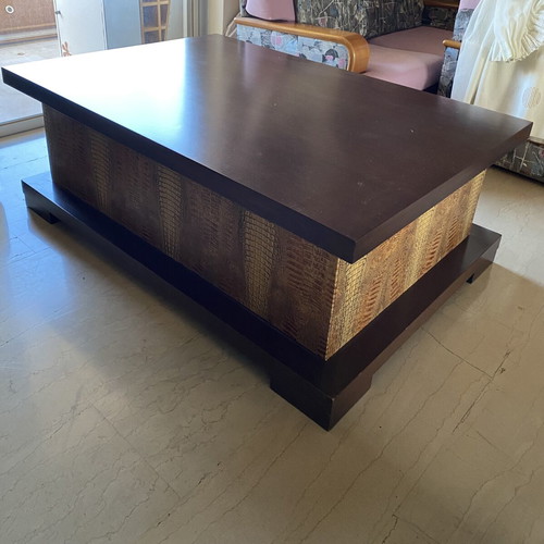 Coffee table like new with dark wood and crocodile leather texture