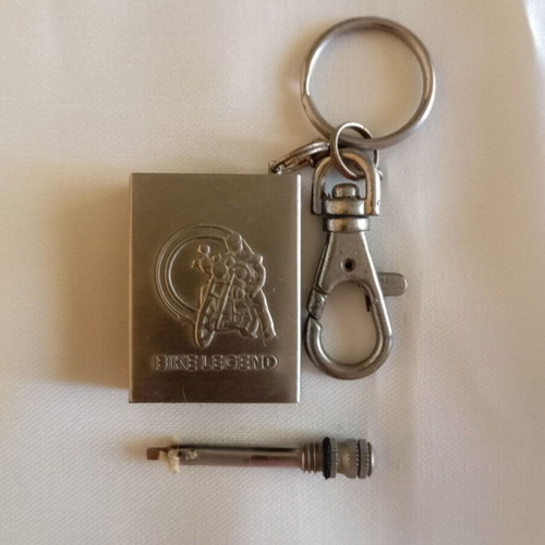 Vintage biker legend keychain lighter like new, nickel color
