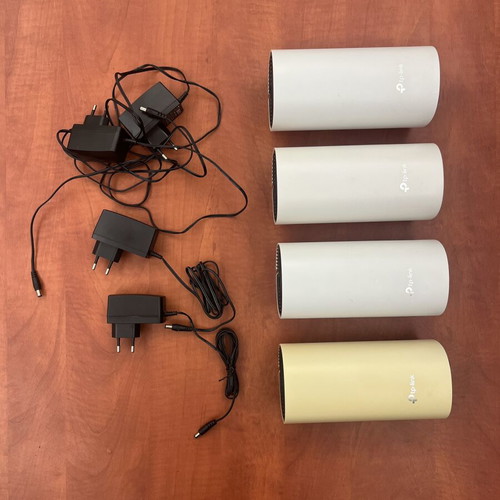 TP-Link Deco M4 mesh WiFi system, 4 units, one sun-faded