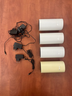 TP-Link Deco M4 mesh WiFi system, 4 units, one sun-faded