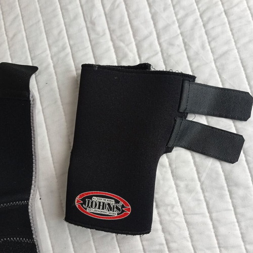 Sensiplast knee brace and John's left wrist orthopaedic splint
