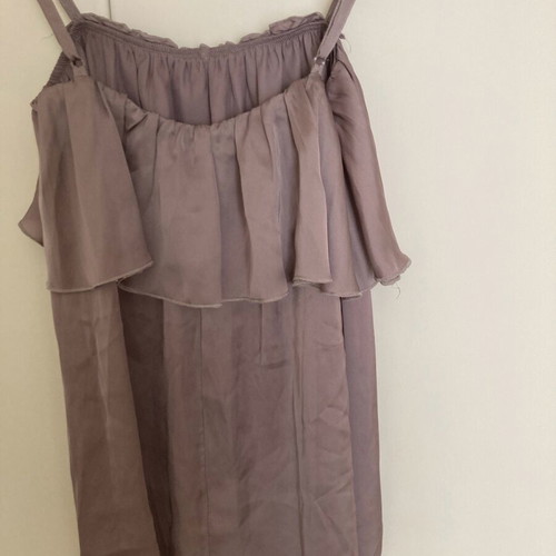 Asymmetric top like new, synthetic with ruffles, size M
