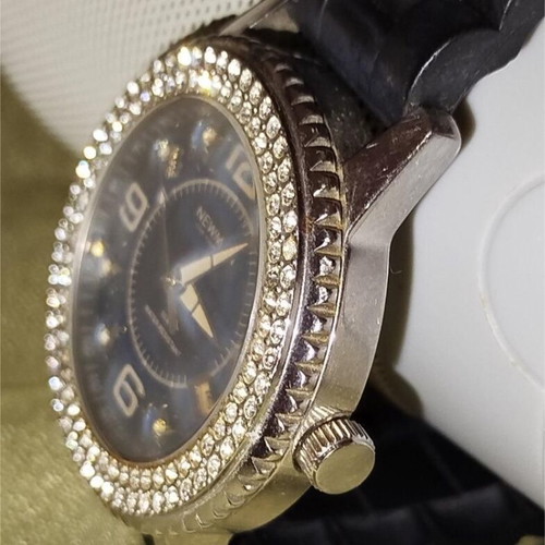 Newman watch used with blue dial and white crystals