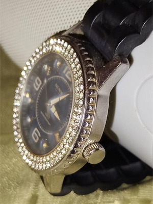 Newman watch used with blue dial and white crystals