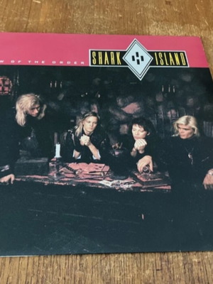 Shark Island Law Of The Order vinyl record like new, rock