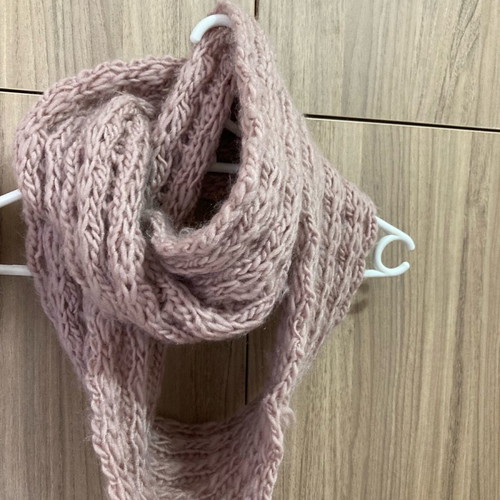 Women's knitted pink neck scarf used