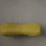Yellow plastic dog toy with squeaker