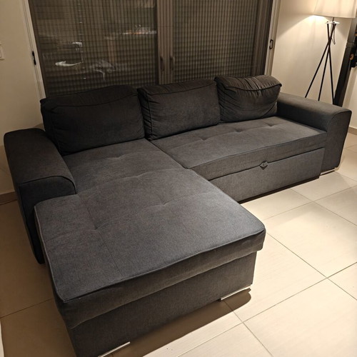 Corner sofa like new with storage and bed function