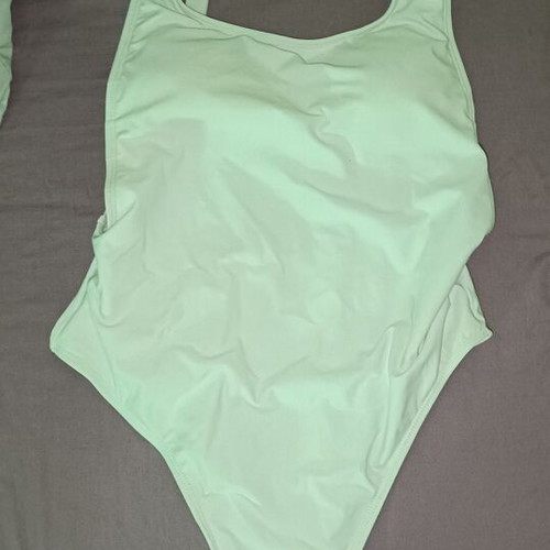 White one-piece swimsuit used, high-cut, sizes M-L