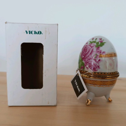 Porcelain decorative egg like new