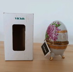 Porcelain decorative egg like new