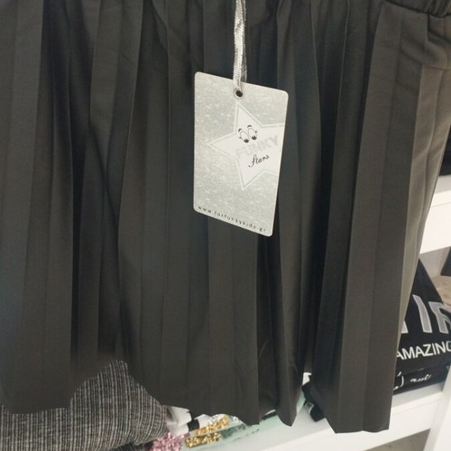 Leather skirt new, black, sizes 10 to 16 years