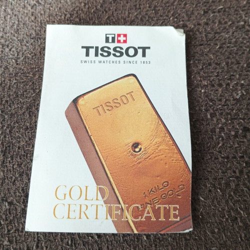 Tissot Classic Gent watch with 18k gold bezel, quartz, new