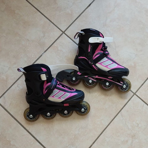 Rollers adjustable size 33-36, like new, black/fuchsia