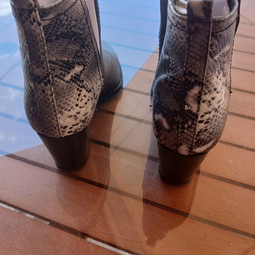 Estil women's black ankle boots with snake print detail