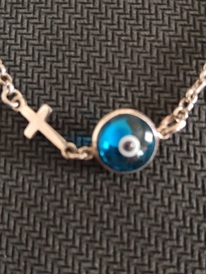 Silver necklace with eye and cross, like new