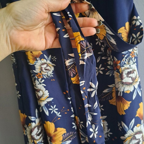 Sleeveless V-Neck Wide Leg Jumpsuit new, navy blue with floral patterns