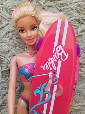 Barbie Merliah 2-in-1 doll with surfboard and mermaid tail