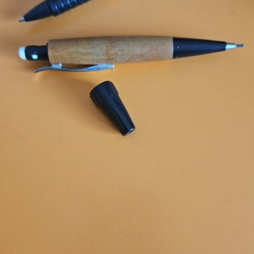 Faber Castell mechanical pencil and pen made of wood like new