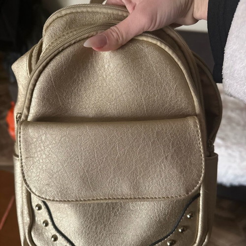 Backpack like new, gold color