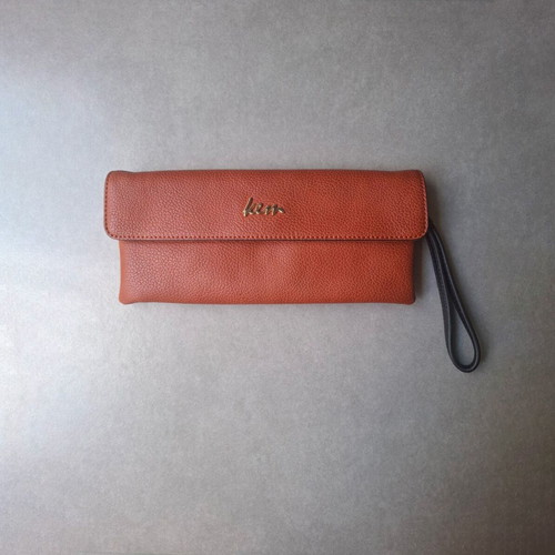 KEM wristlet clutch like new, burgundy embossed faux leather