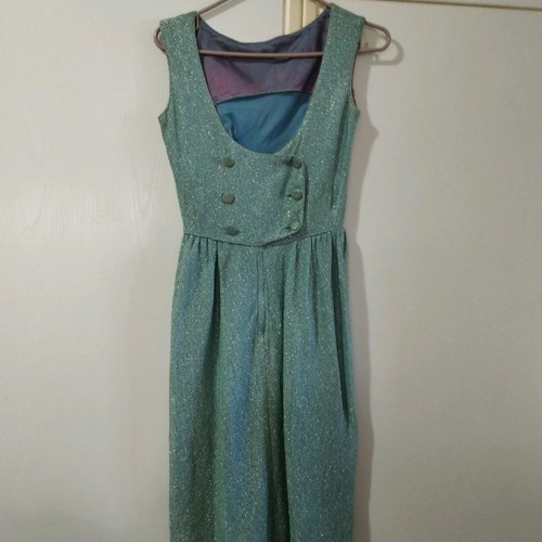 Vintage dress used with silver thread and subtle signs of wear