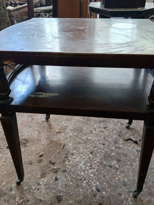 Vintage coffee table with wheels used and shelf