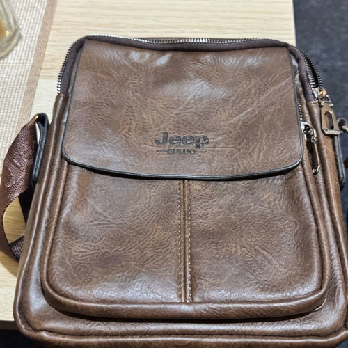 Jeep bag like new, brown with multiple pockets
