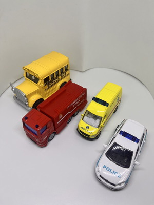 Metal toy vehicles set of 4, like new