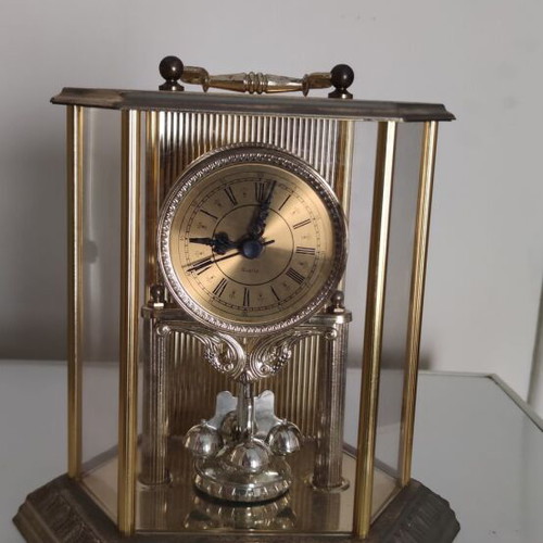 Vintage anniversary table clock with rotating pendulum (80s-90s)