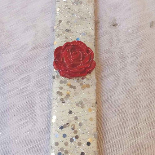 White candle with red clay rose new