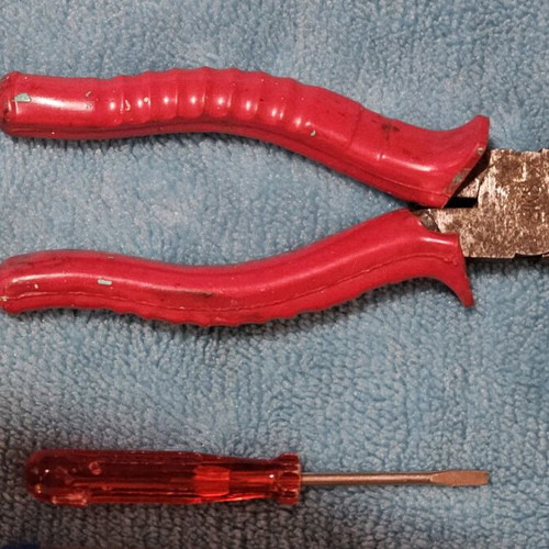 Hand tool set used with screwdrivers, pliers, hammer and work gloves