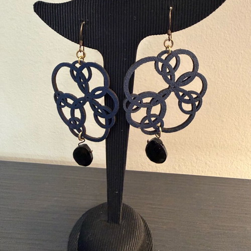 Earrings with blue laser cut leather flower design like new
