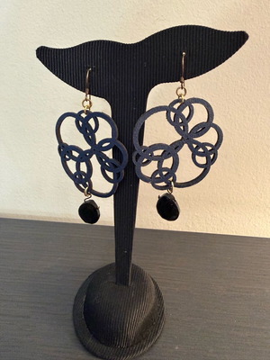 Earrings with blue laser cut leather flower design like new