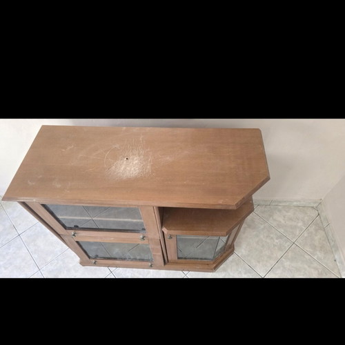 Wooden TV unit with glass doors used, storage space