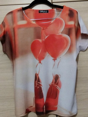 Women's short-sleeve blouse with balloon and shoe design like new