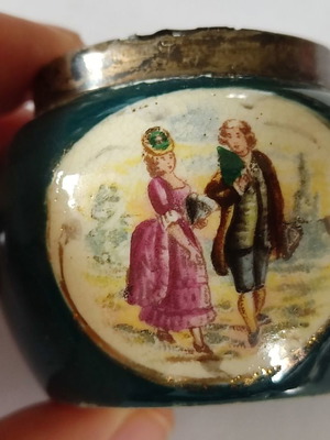 English porcelain vase with silver ring used, 1900 depiction
