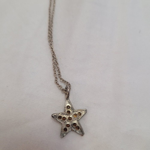 Star design necklace with rhinestones